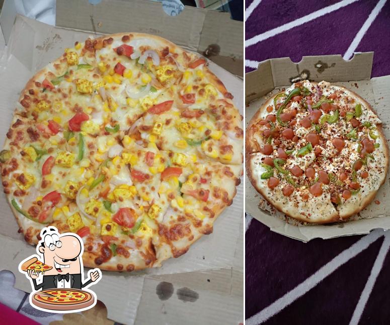 Get pizza at Roms Pizza