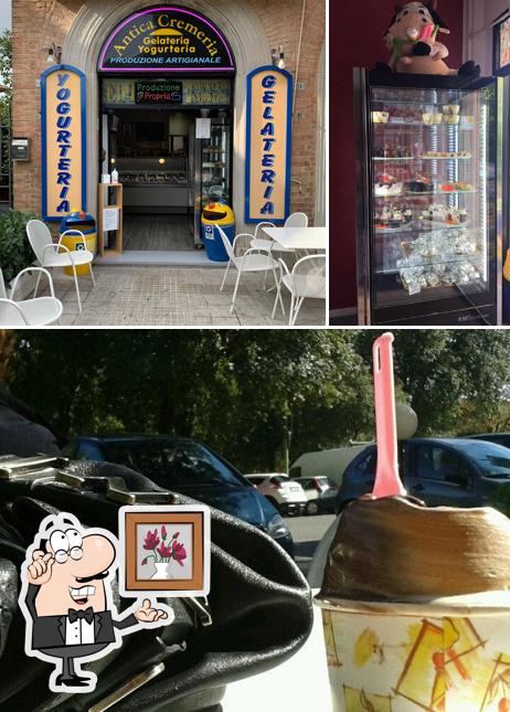 Guarda la immagine che raffigura la interni e esterno di Antica Cremeria