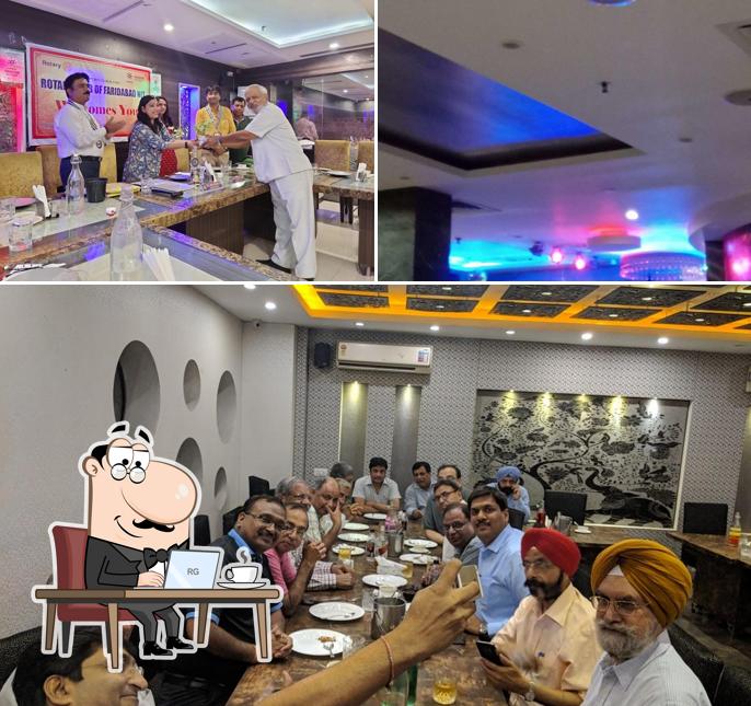 Take a seat at one of the tables at AGGRAFE