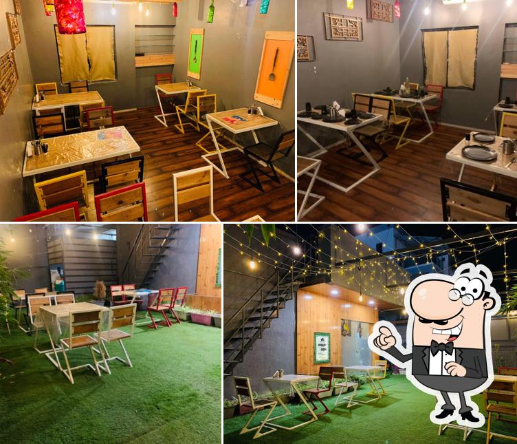 The interior of Hungry Birds - Waghodia Restaurant