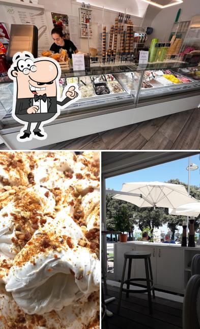 Guarda la foto che mostra la interni e cibo di Gelateria