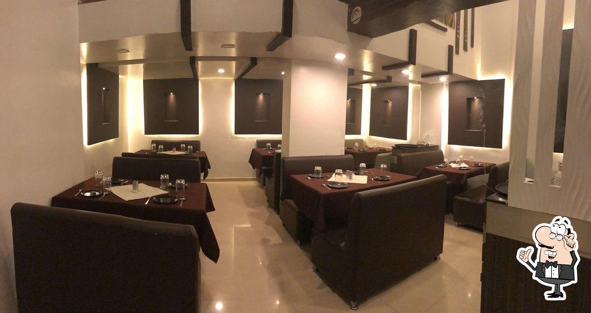 Take a seat at one of the tables at Palvi pure veg