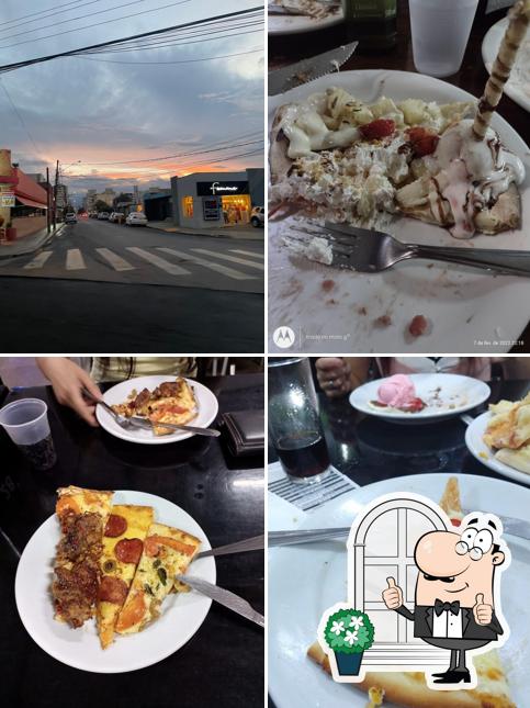 O exterior do Pizzaria Três Irmãos