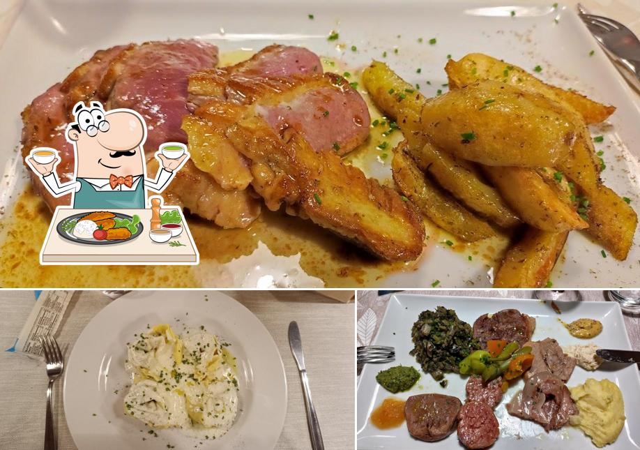 Cibo al Trattoria all'Oca Bianca