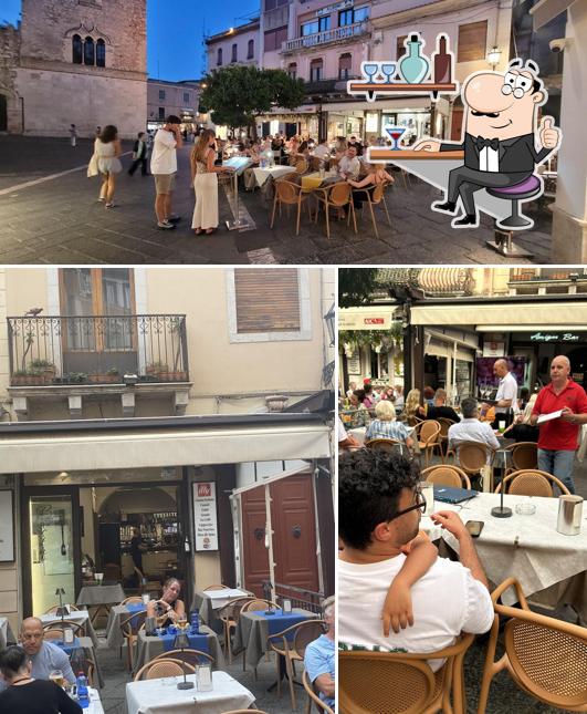 Siediti a un tavolo di Amigos Bar
