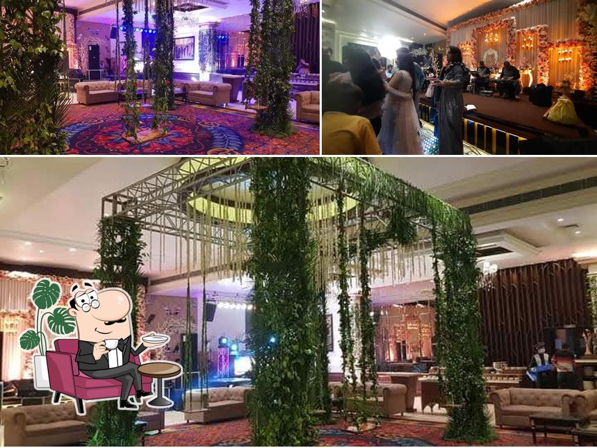 Take a seat at one of the tables at Candlewood Hotel & Banquet