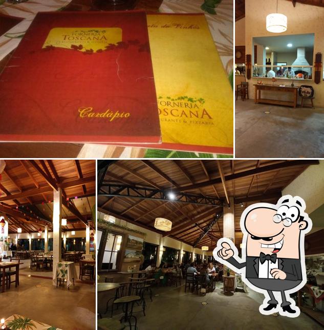O interior do Forneria Toscana Pizzaria