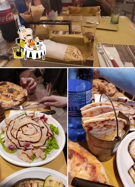 Piadineria Pizzeria Desirè si caratterizza per la cibo e interni