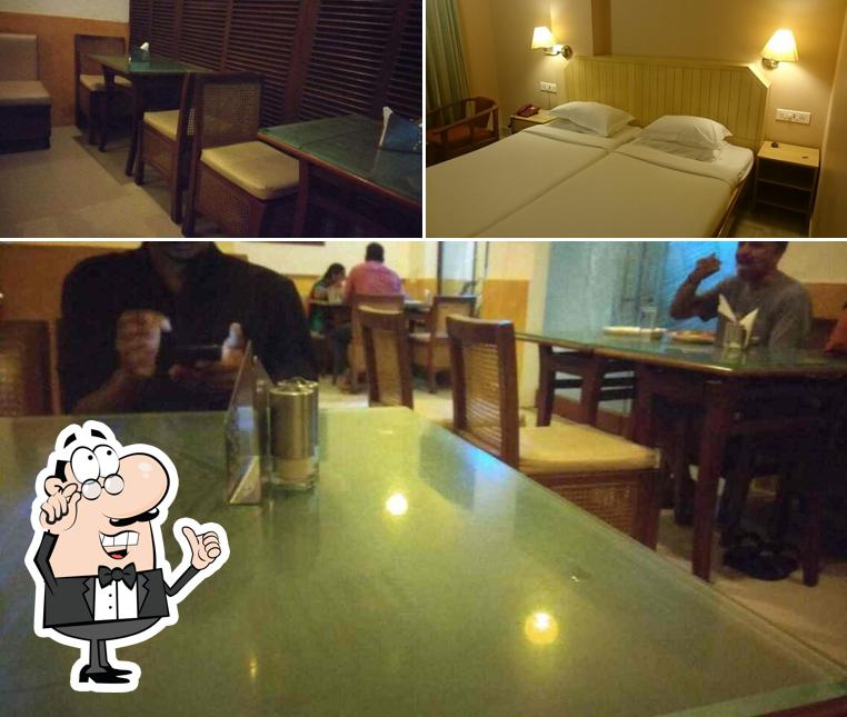 Take a seat at one of the tables at Hotel Surguru