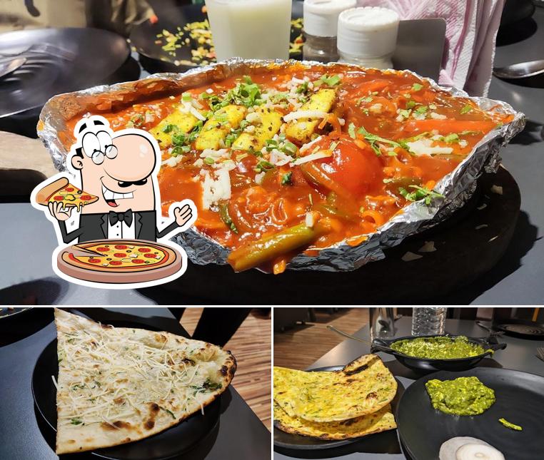 Pick pizza at Krishna Cafe and Restaurant