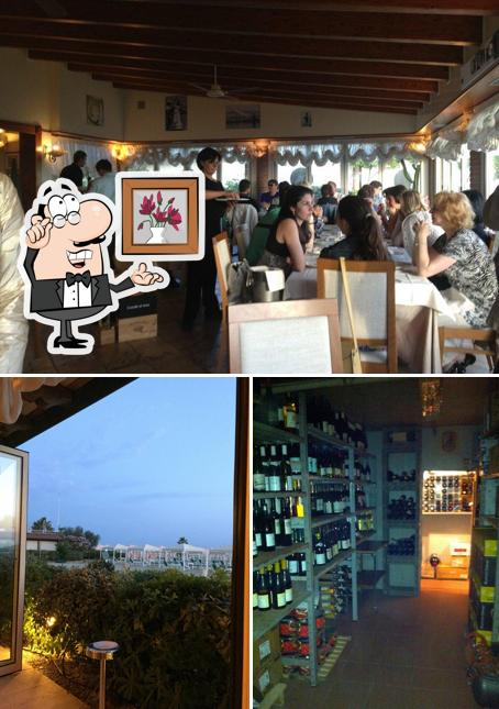 La foto di interni e vino da Ariston Mare