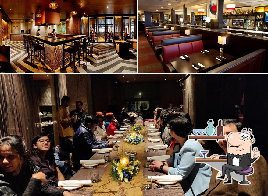 Take a seat at one of the tables at Baluchi Take a seat at one of the tables at Baluchi