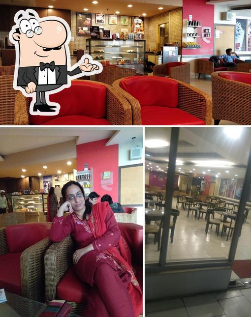 The interior of Cafe Coffee Day - Inside Amity University