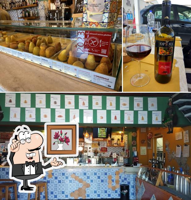 Questa è la foto che mostra la interni e alcol di L'Arancineria Gourmet Marzamemi