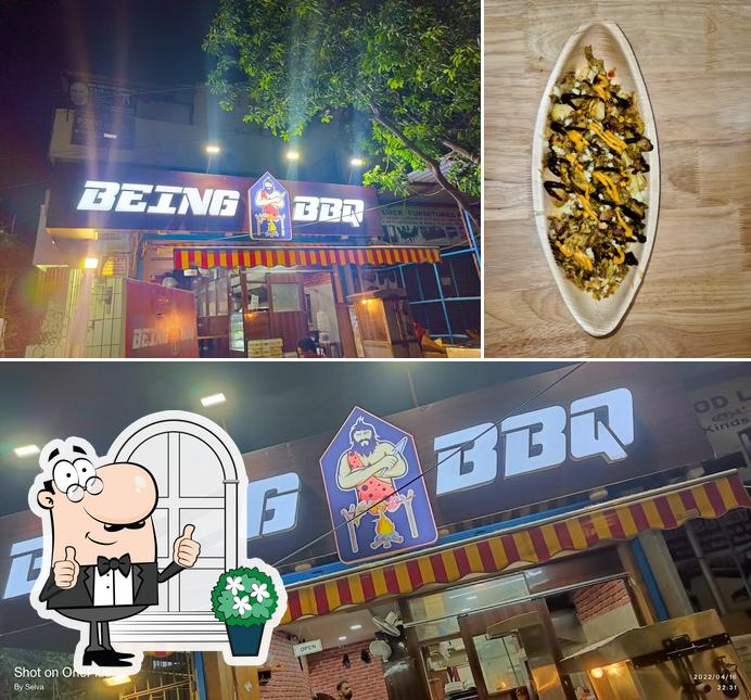 Take a look at the photo showing exterior and food at BEING BBQ