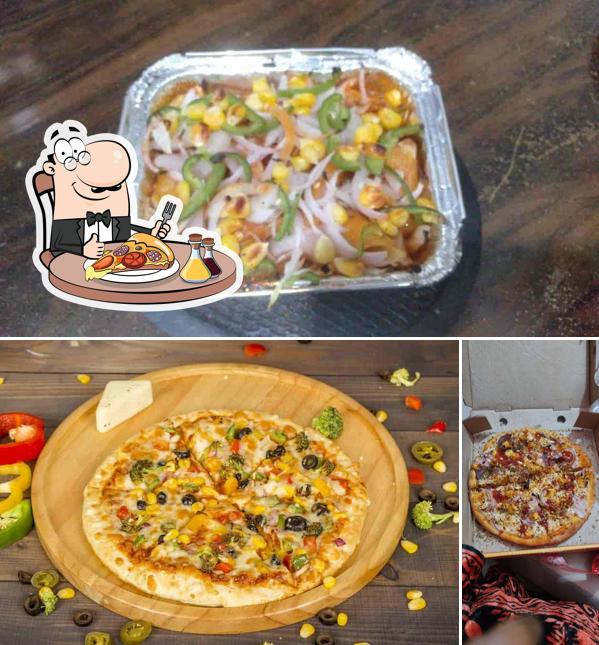 Get pizza at Peezzaa Spot