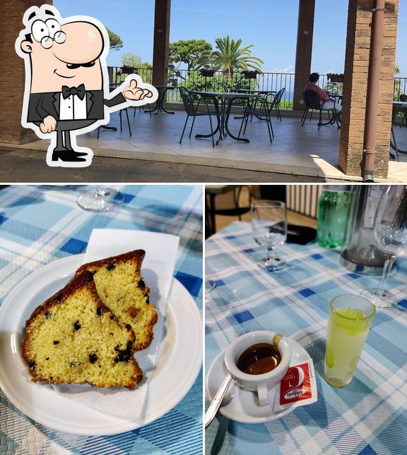 Questa è la immagine che mostra la interni e cibo di Garden Bar