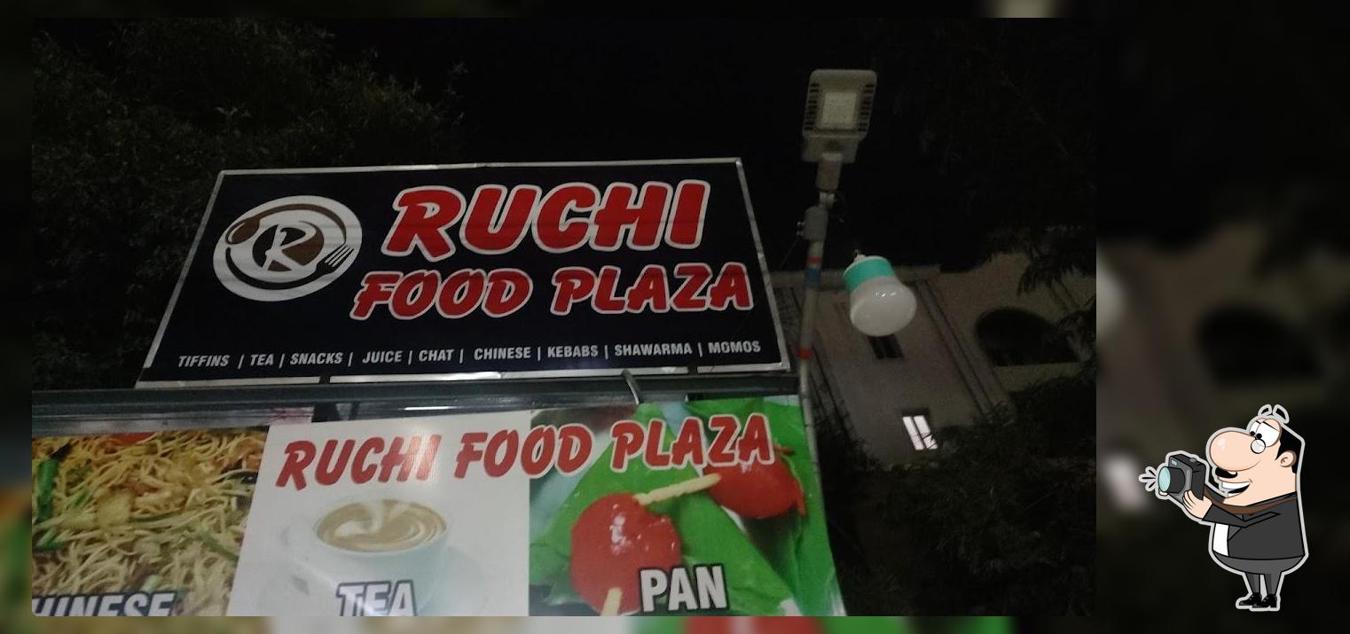 The advertisement shows information about Ruchi Food Plaza