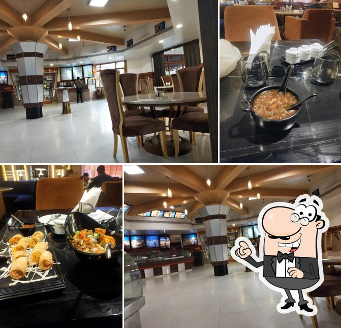 Take a seat at one of the tables at Big Bite Restaurant