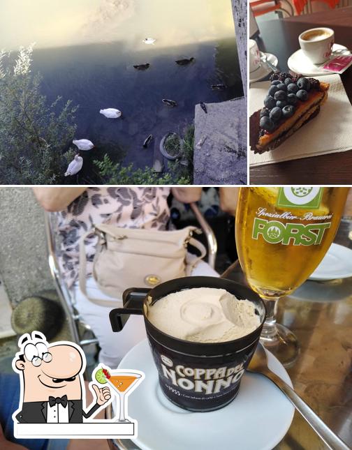 Questa è la foto che presenta la bevanda e pesce di Elisir Caffè