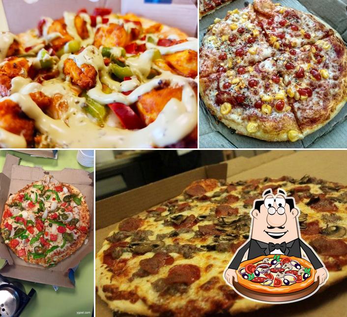 Get pizza at Domino's Pizza Sugghar, Palampur
