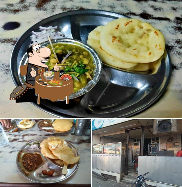Among various things one can find food and exterior at RADHE CHOLE BHATURE