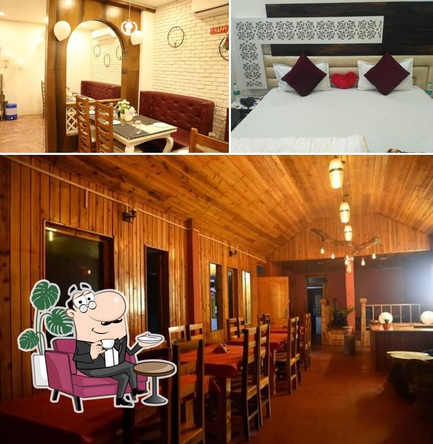 Take a seat at one of the tables at The Pride Restaurant
