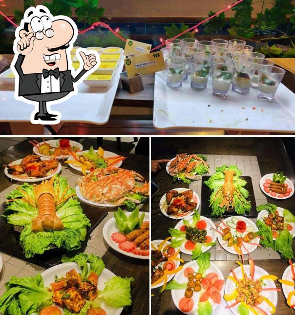 Take a seat at one of the tables at Barbeque Nation