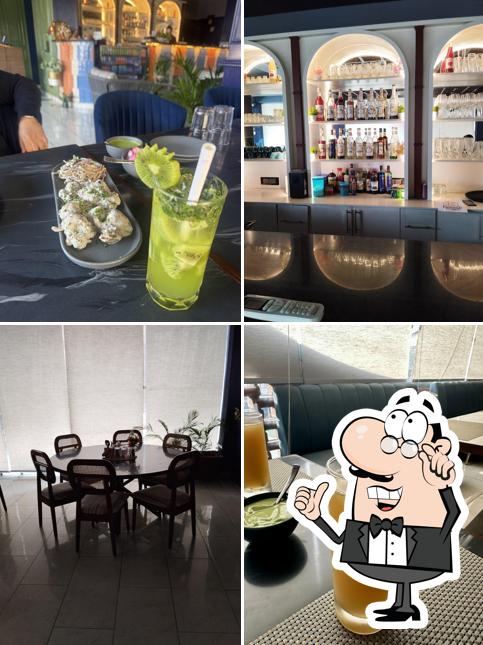 Take a seat at one of the tables at Satwah Gourmet Dining