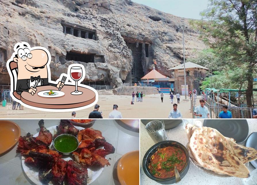 The photo of food and exterior at Hotel Karla Gate