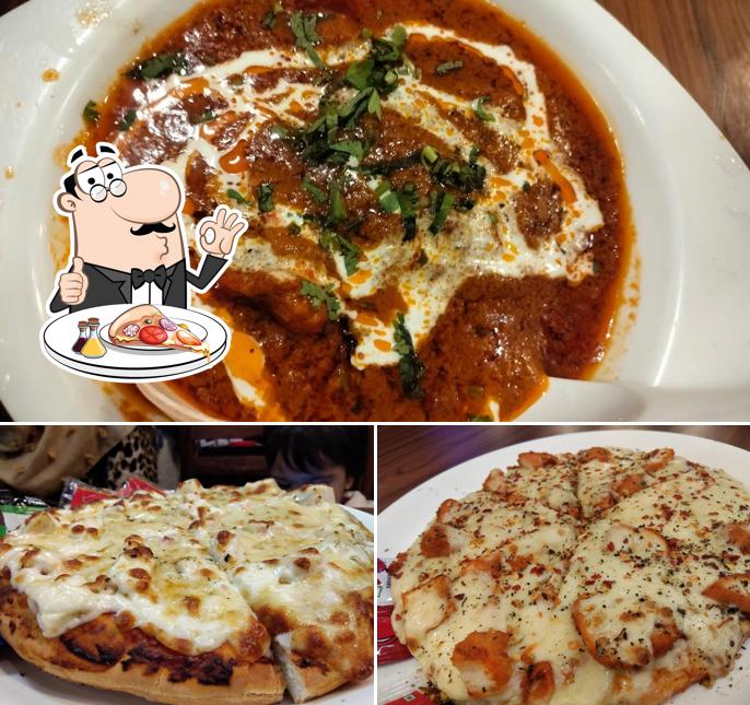 Try out pizza at Zahra Restaurant & Café - Shaheen bagh