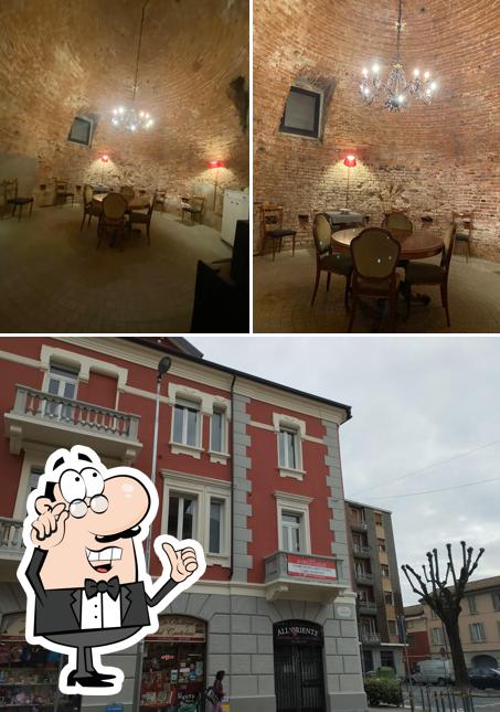Guarda la immagine che raffigura la interni e esterno di Ristorante All' Oriente