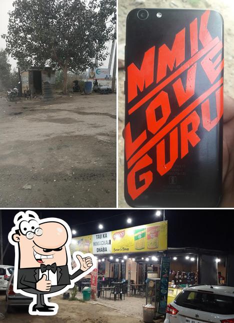 Look at the picture of Tau Ka Himachal Veg Dhaba