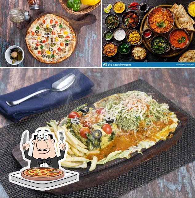 Pick pizza at Mr. Multicuisine Restaurant and Banquets