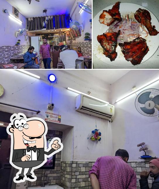 Take a look at the image depicting interior and seafood at The Bhojpur Hotel
