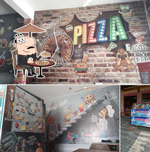The exterior of MANNAT PIZZA HUT $ BAKERY