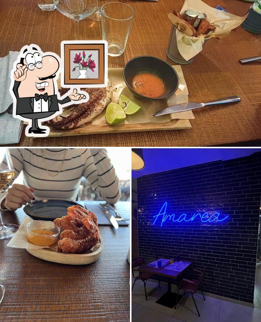 La immagine di interni e cibo da Ristorante Amarea