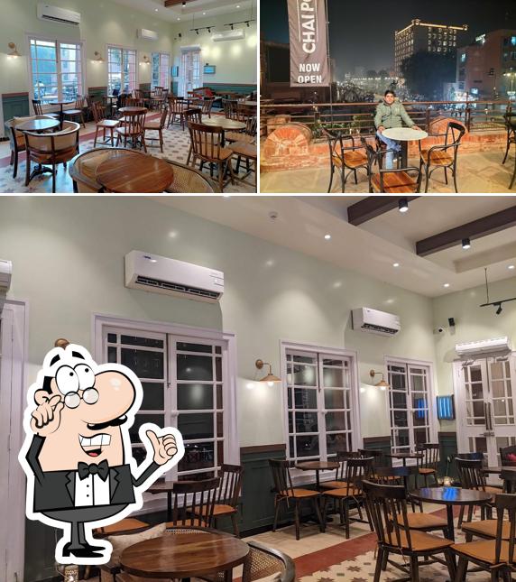 Take a seat at one of the tables at Chai Point - Ahluwalia