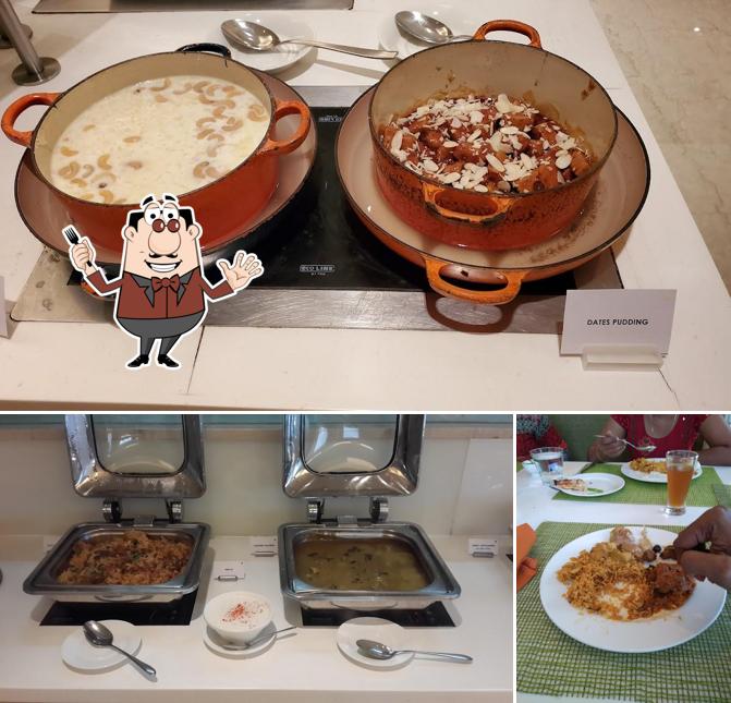 The picture of food and dining table at The Kitchen