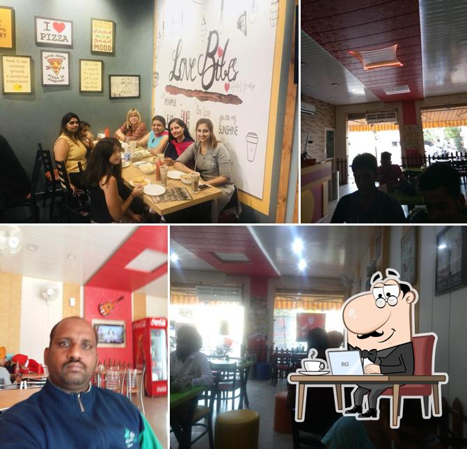 Take a seat at one of the tables at Yummy Kitchen