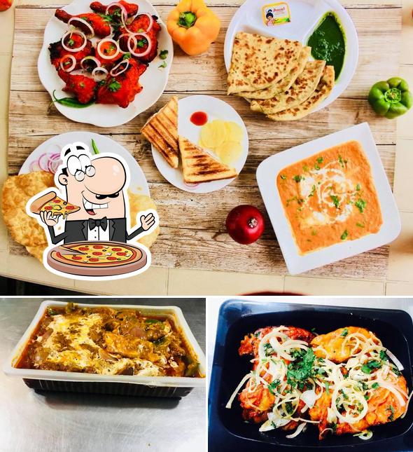 Get pizza at Yummy Tummy
