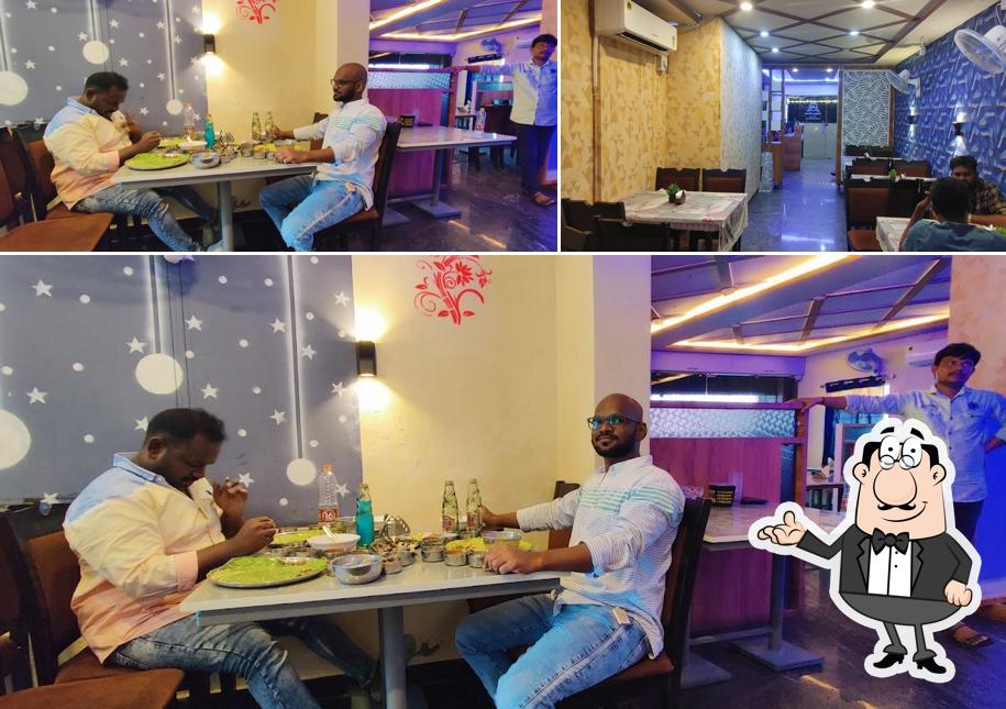 Take a seat at one of the tables at Grand Family Restaurant