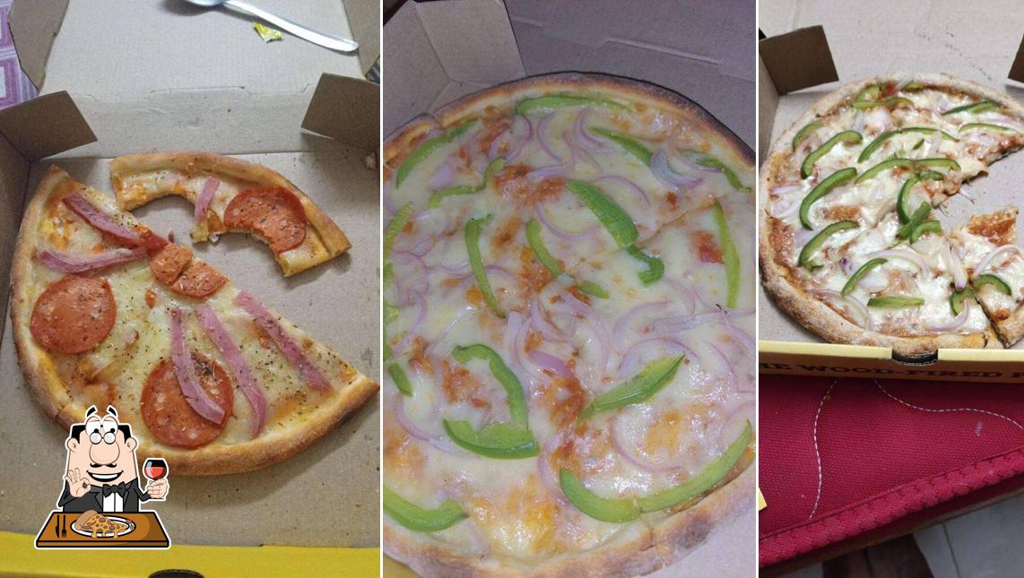 Pick pizza at Olio - The Wood Fired Pizzeria