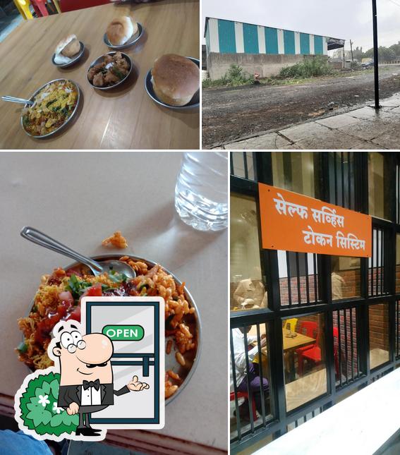 The photo of exterior and food at Ambika Vadapaav Centre