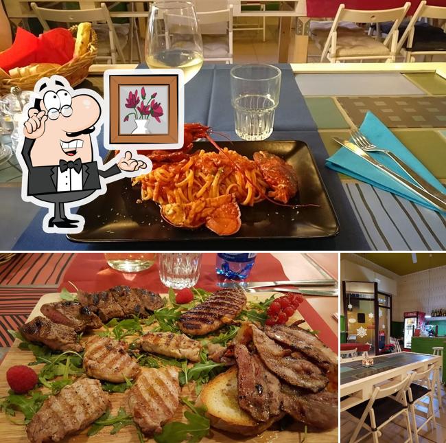 Questa è la immagine che mostra la interni e cibo di Il Corallo sas
