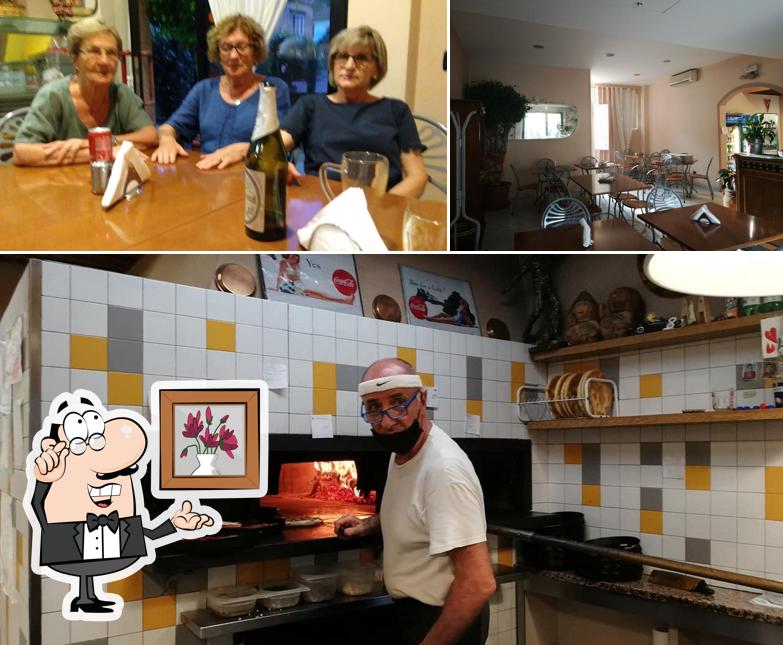 Dai un'occhiata agli interni di Pizzeria Il Campetto