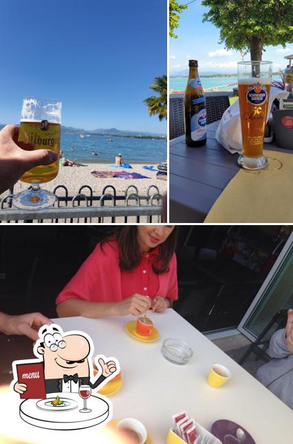 La foto della cibo e tavolo da pranzo di Lido Cappuccini