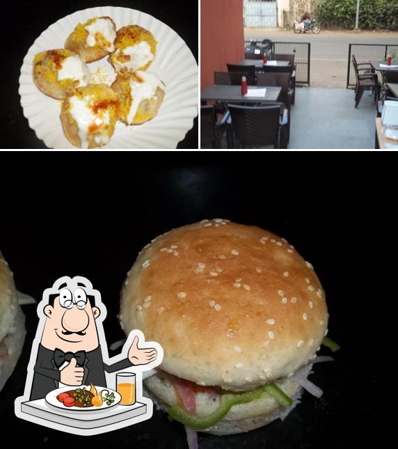 Take a look at the picture depicting food and interior at A.D's Kitchen