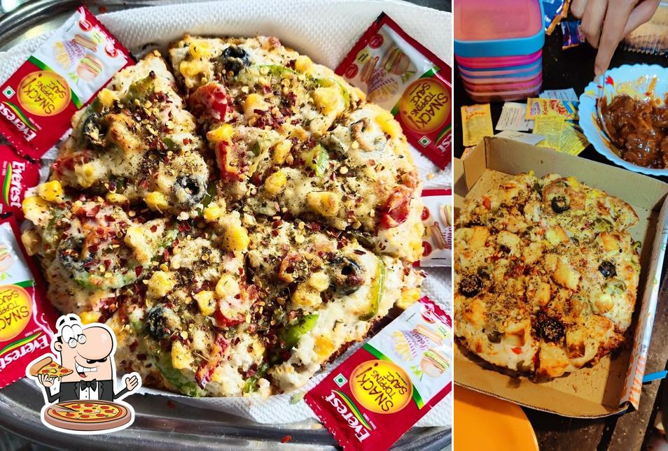 Order pizza at Adhinath fast food & ice Cream Parlor