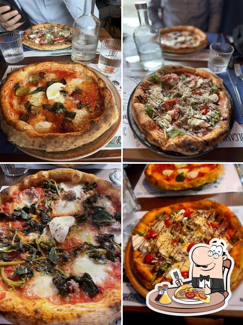 Scegli una pizza a Vulcano Milano Osteria con Pizza